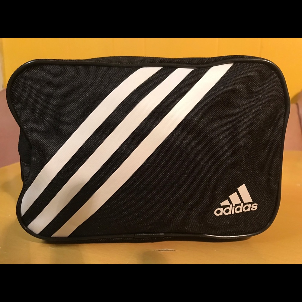- Adidas brand handy bag.